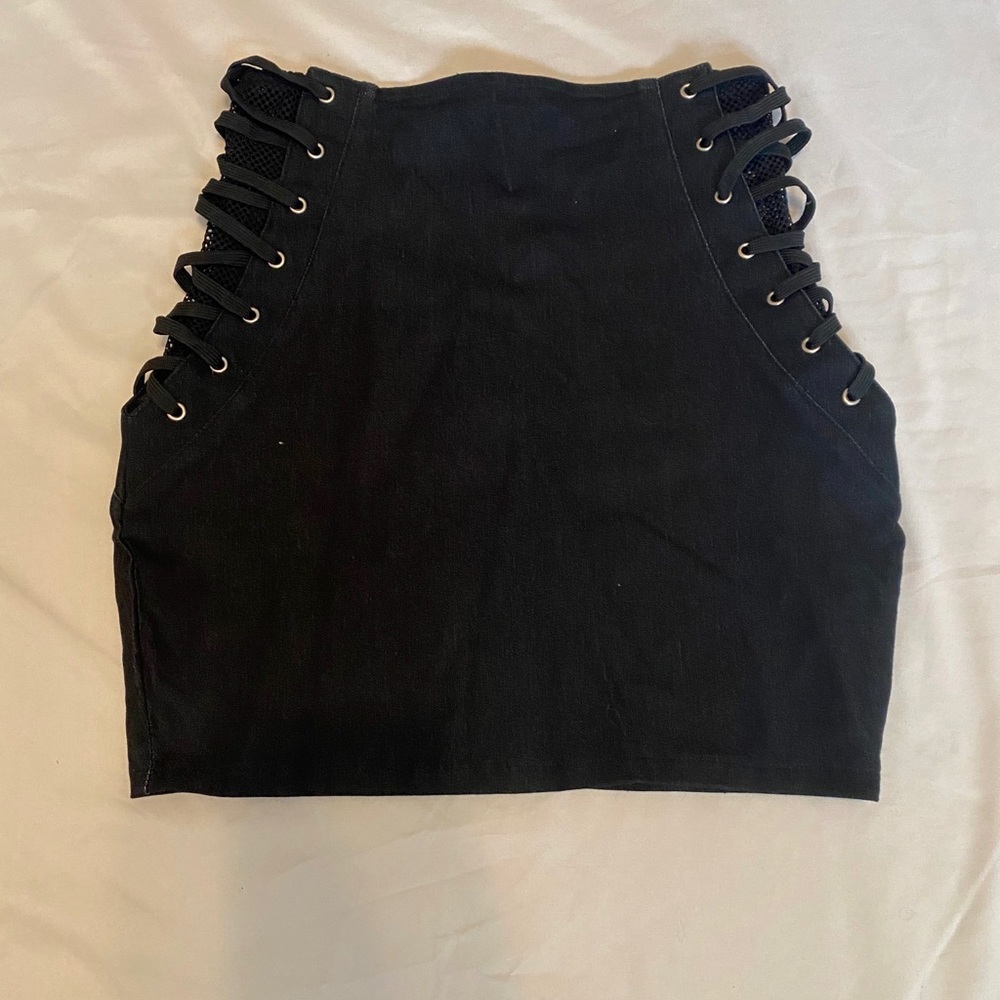 Black pencil skirt with intricate sides